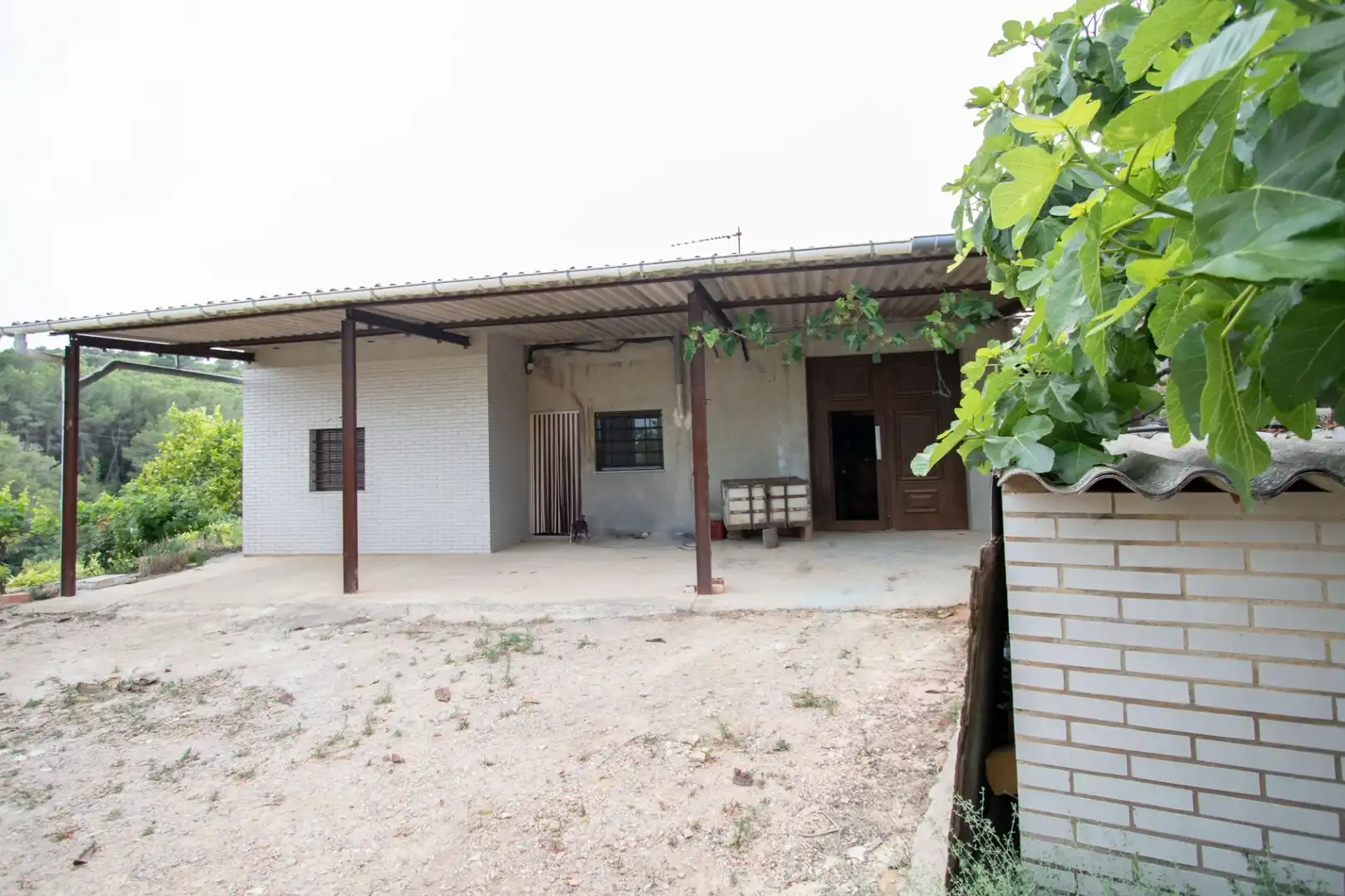 Vista exterior de Finca rústica en venda en Benlloc amb Jardí privat, Terrassa i Traster