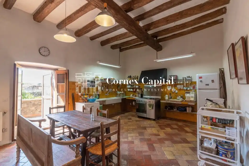 Cocina de Finca rústica de alquiler en Rupià con Aire acondicionado, Calefacción y Jardín privado