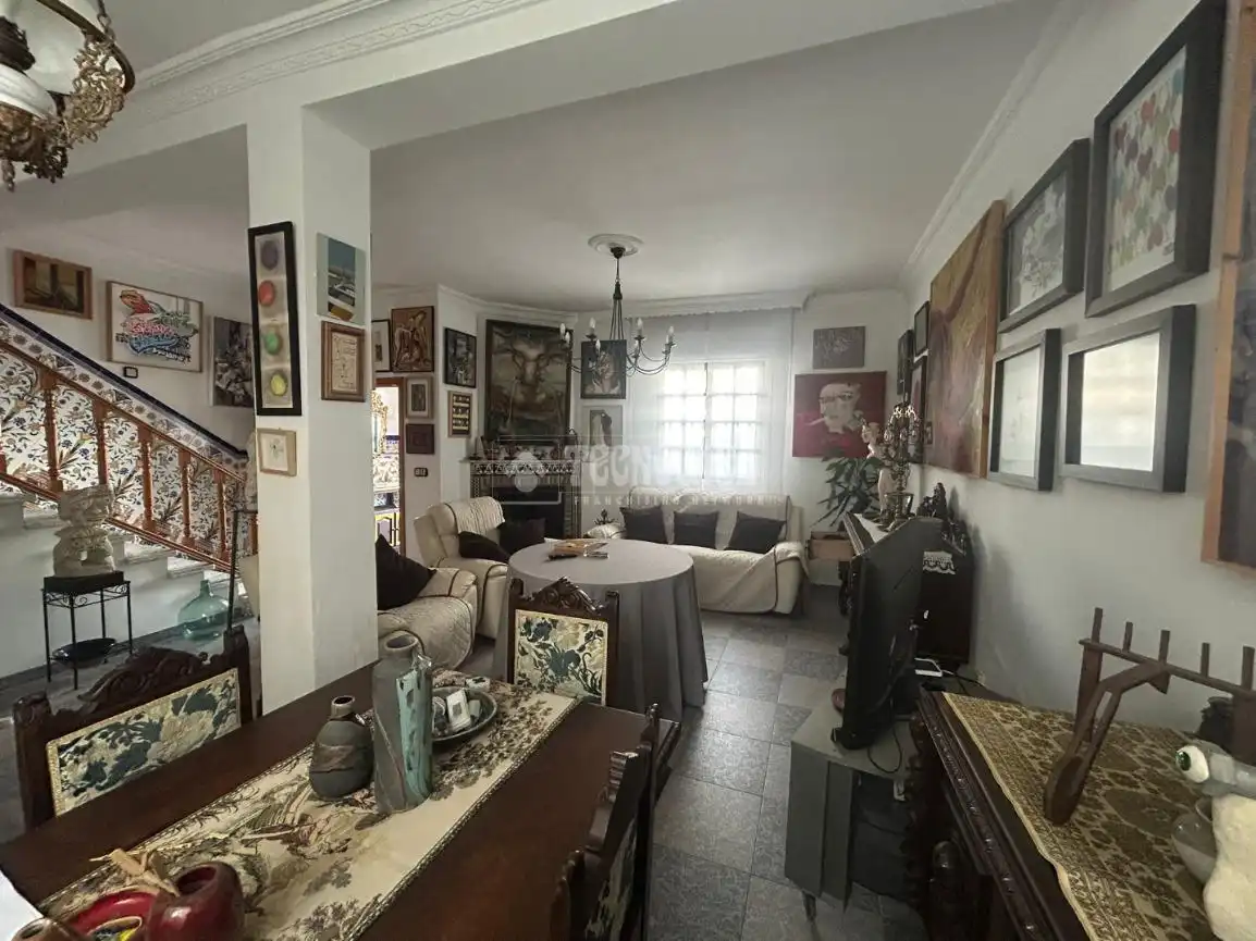 Sala de estar de Casa adosada en venta en Huelva con Aire acondicionado