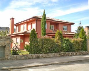 Exterior view of House or chalet for sale in Hoyo de Manzanares  with Private garden, Parquet flooring and Terrace