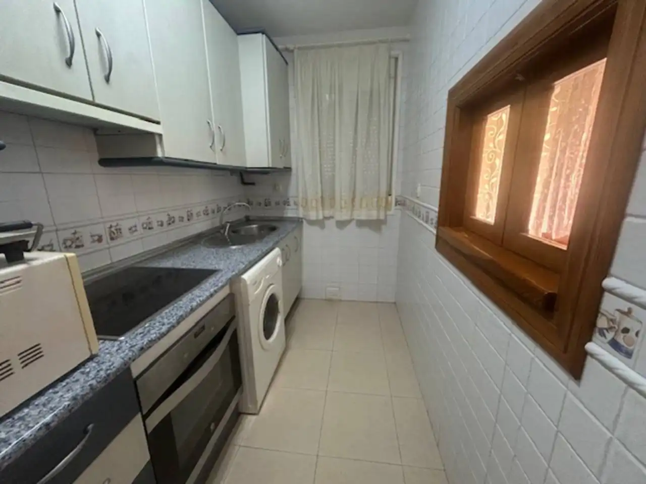Kitchen of Flat for sale in Roquetas de Mar  with Air Conditioner, Terrace and Furnished