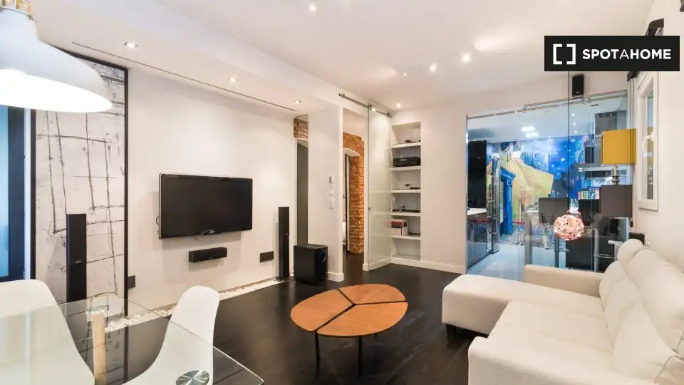 Sala de estar de Estudio para compartir en Madrid con Aire acondicionado, Terraza y Amueblado