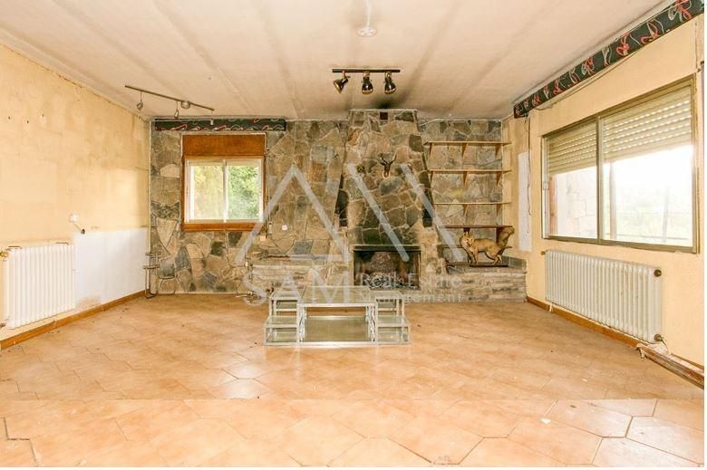 Sala d'estar de Casa o xalet en venda en Marganell amb Calefacció, Jardí privat i Balcó