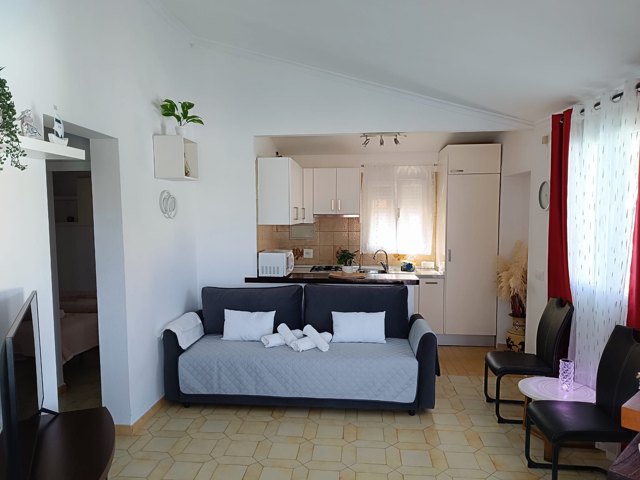 Sala d'estar de Casa adosada en venda en Calpe / Calp amb Aire condicionat, Calefacció i Jardí privat