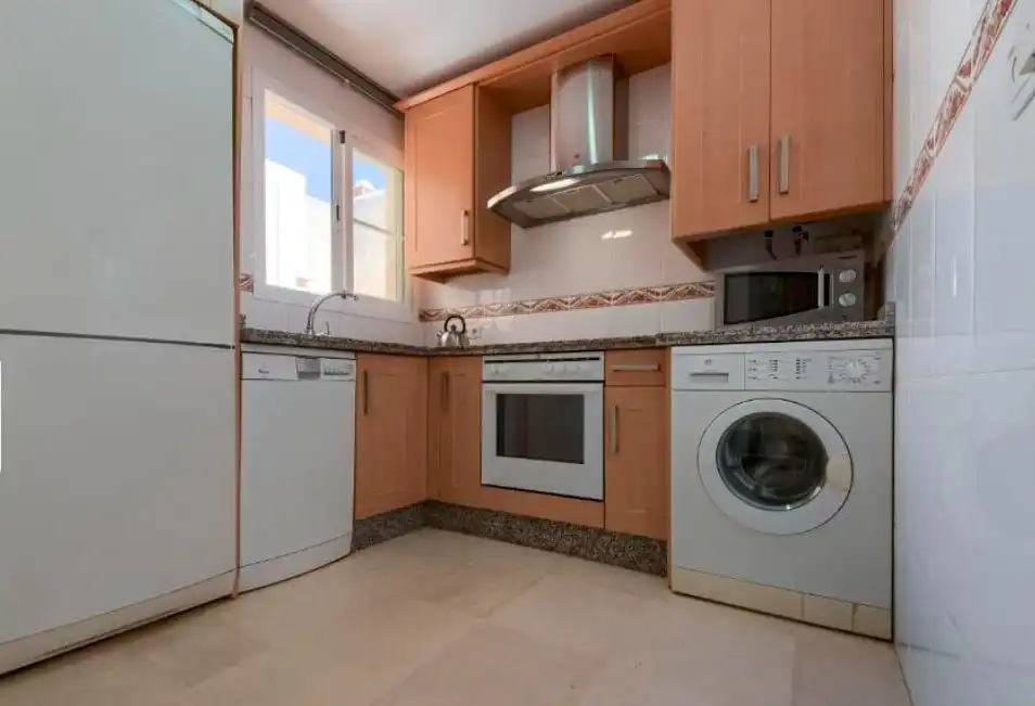 Kitchen of Flat for sale in Benalmádena  with Air Conditioner, Terrace and Community pool