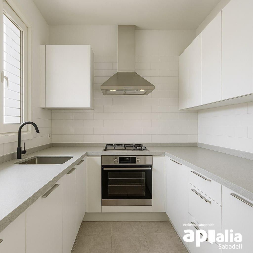 Kitchen of Flat for sale in Sabadell  with Balcony and Alarm