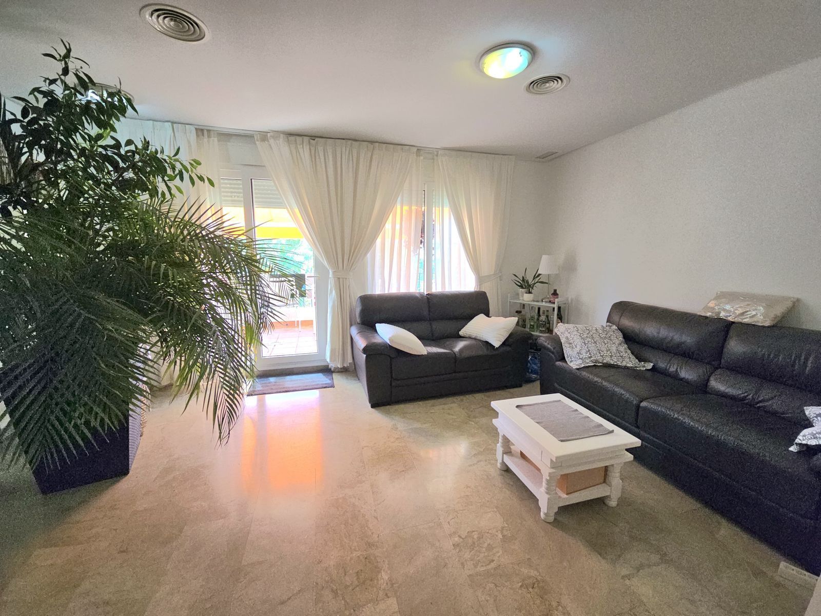 Living room of Apartment for sale in Benalmádena  with Air Conditioner, Terrace and Storage room
