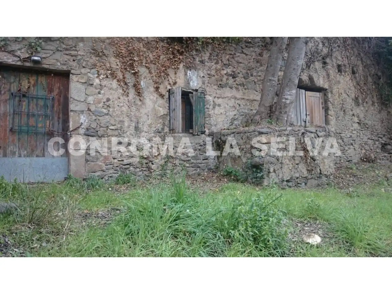 Casa rústica amb jardí en venda a Tordera pueblo