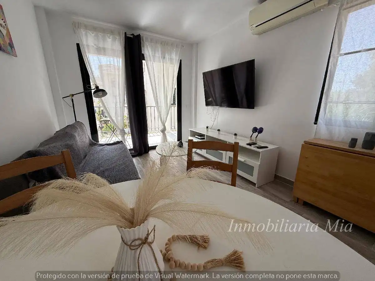 Sala d'estar de Apartament en venda en Torremolinos amb Aire condicionat, Jardí privat i Terrassa