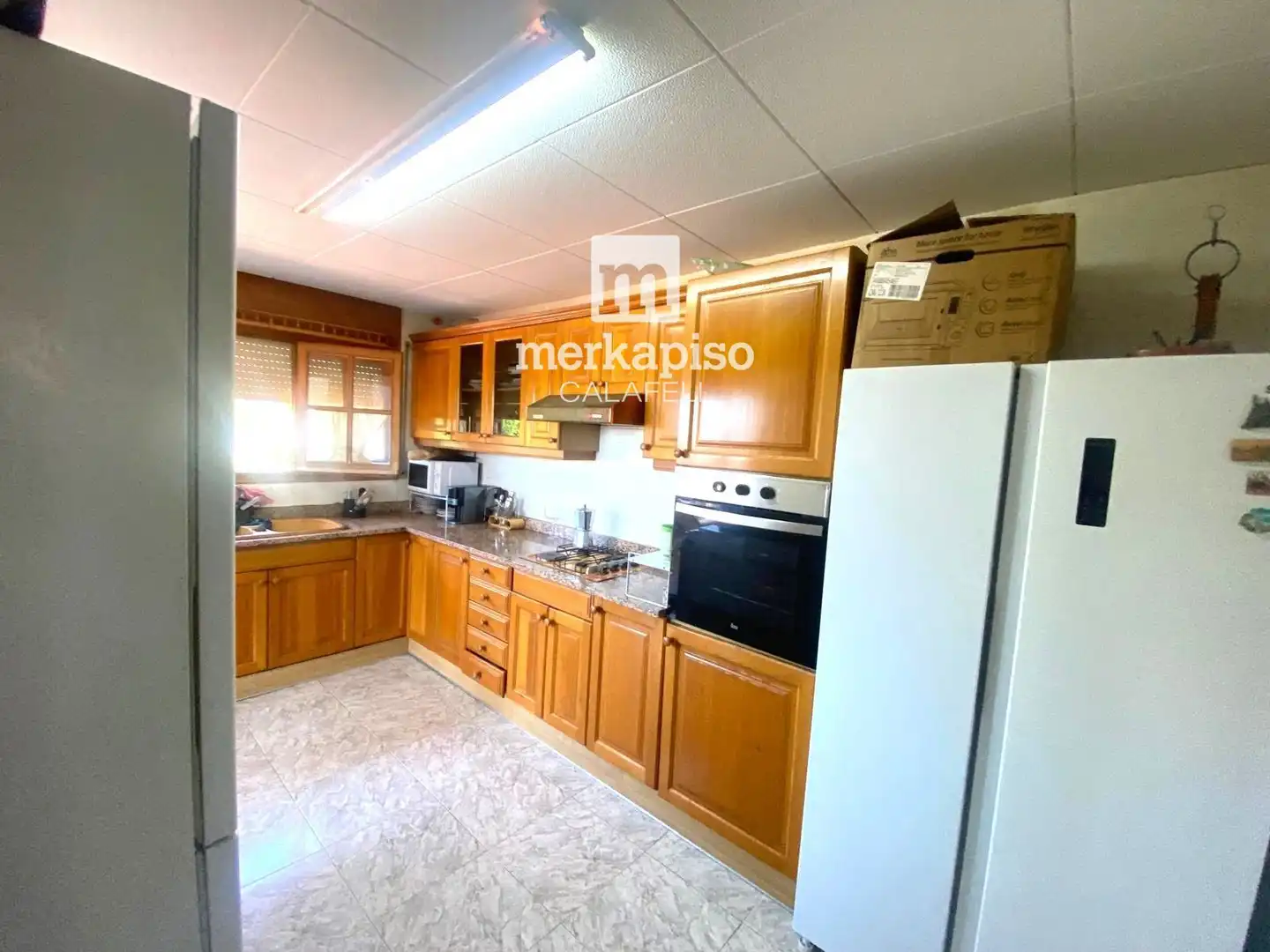 Cuina de Casa o xalet en venda en Cunit amb Jardí privat, Terrassa i Traster
