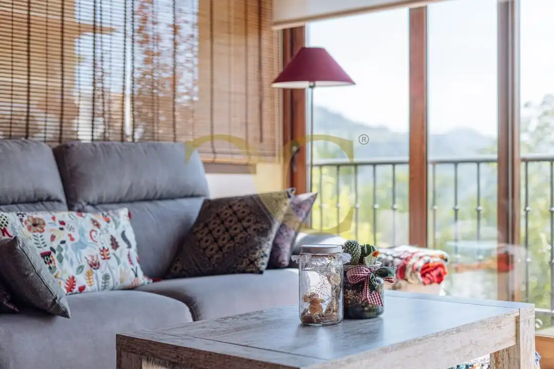 Sala d'estar de Casa o xalet en venda en Cangas de Onís amb Calefacció, Jardí privat i Terrassa