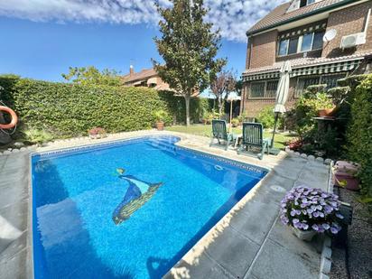 Swimming pool of Single-family semi-detached for sale in Fuenlabrada  with Air Conditioner, Terrace and Swimming Pool