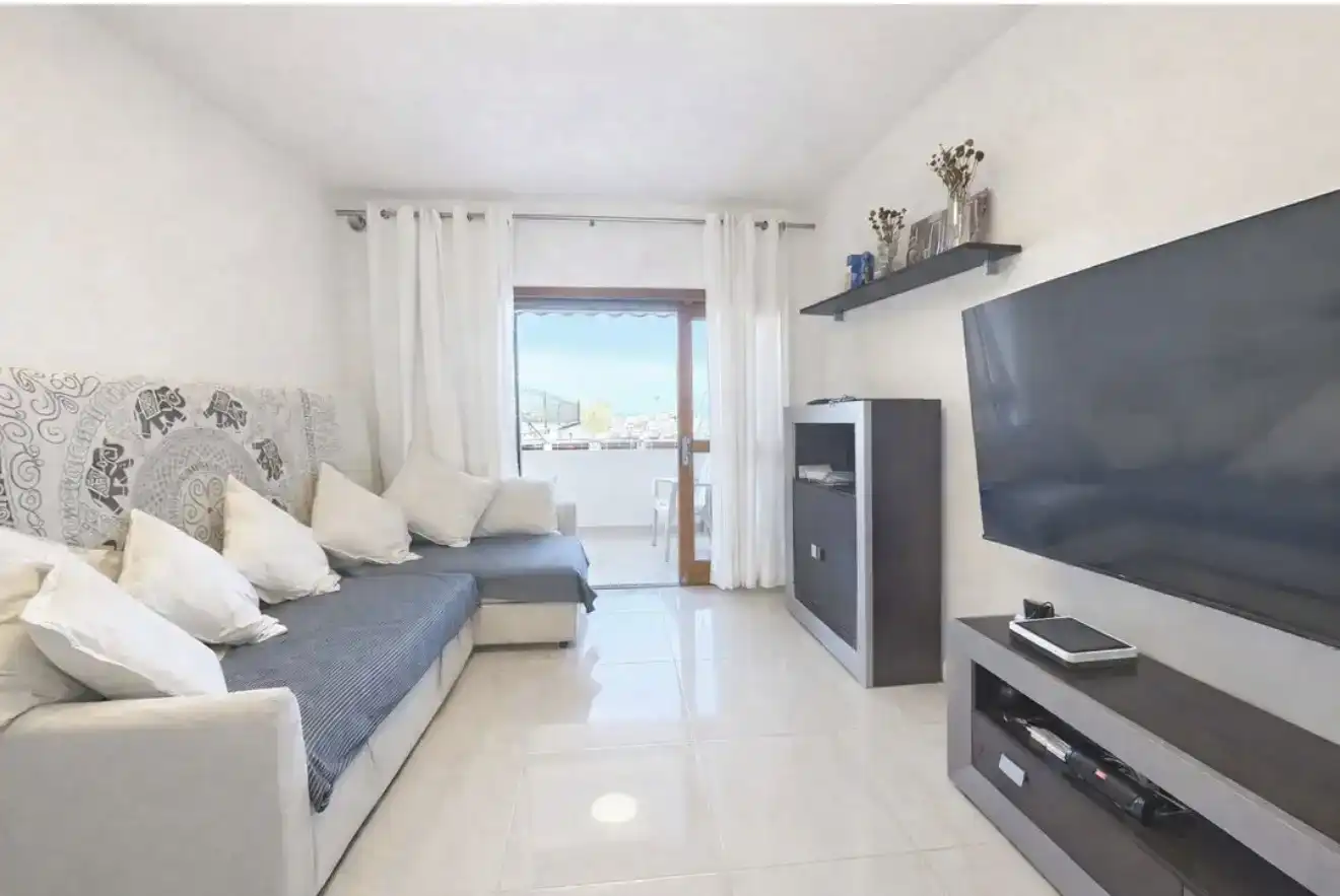 Sala d'estar de Casa adosada per a compartir en Playa de las Américas