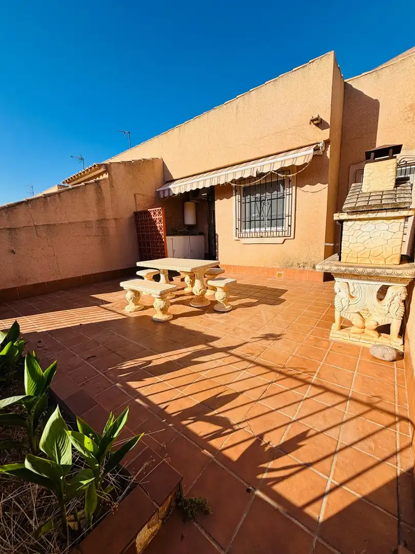 Casa aparellada amb jardí en venda a RAMOS CARRATALA-URRTIAS 97