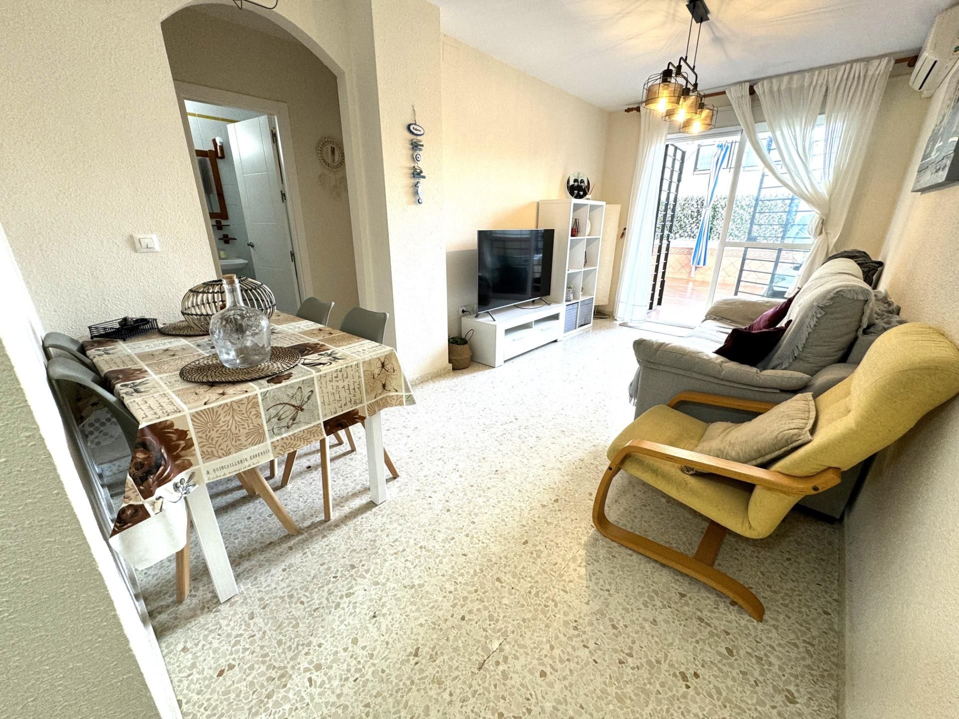 Living room of Planta baja for sale in El Portil  with Air Conditioner, Terrace and Storage room