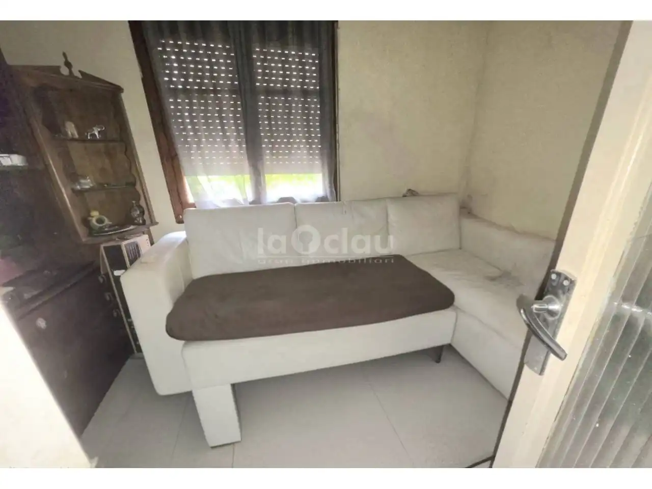 Sala d'estar de Casa adosada en venda en Tona amb Jardí privat, Terrassa i Moblat