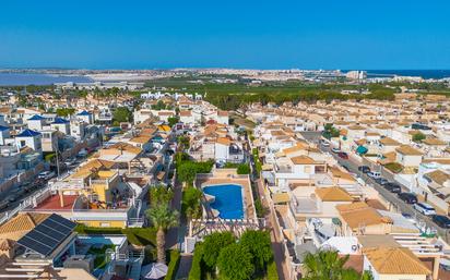 Exterior view of Single-family semi-detached for sale in Torrevieja  with Air Conditioner, Heating and Terrace