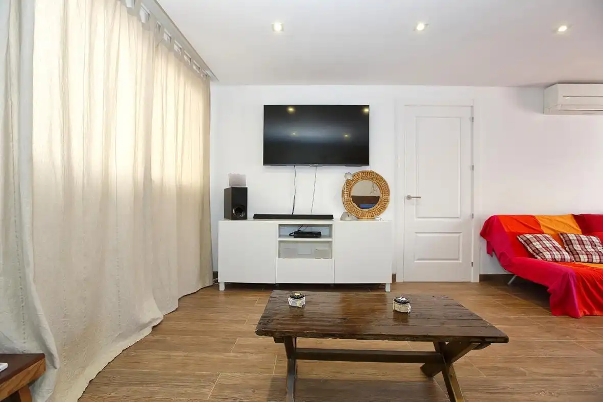 Sala de estar de Casa adosada en venta en Alcanar con Calefacción, Jardín privado y Terraza
