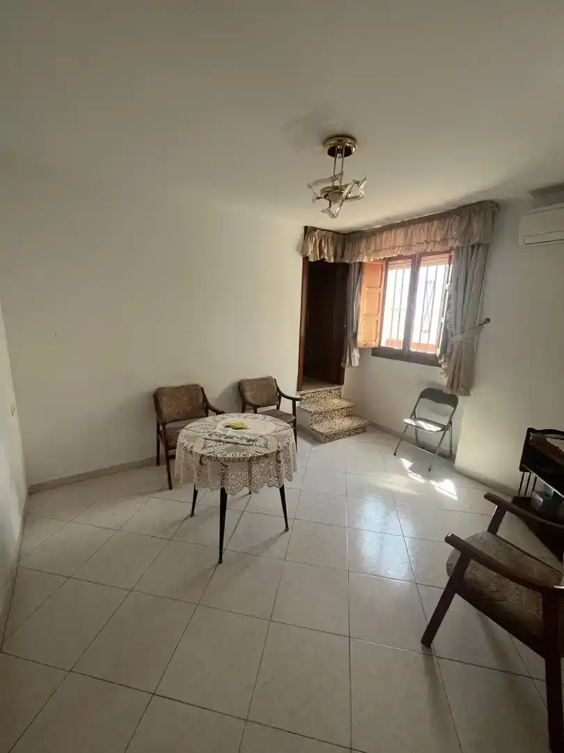 Sala d'estar de Casa adosada en venda en Villanueva de Algaidas amb Aire condicionat