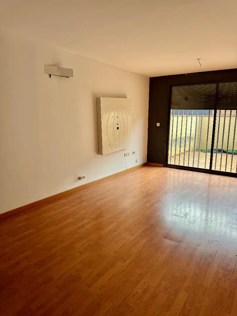 Wohnzimmer von Einfamilien-Reihenhaus zum Verkauf in Reus mit Parkett und Terrasse