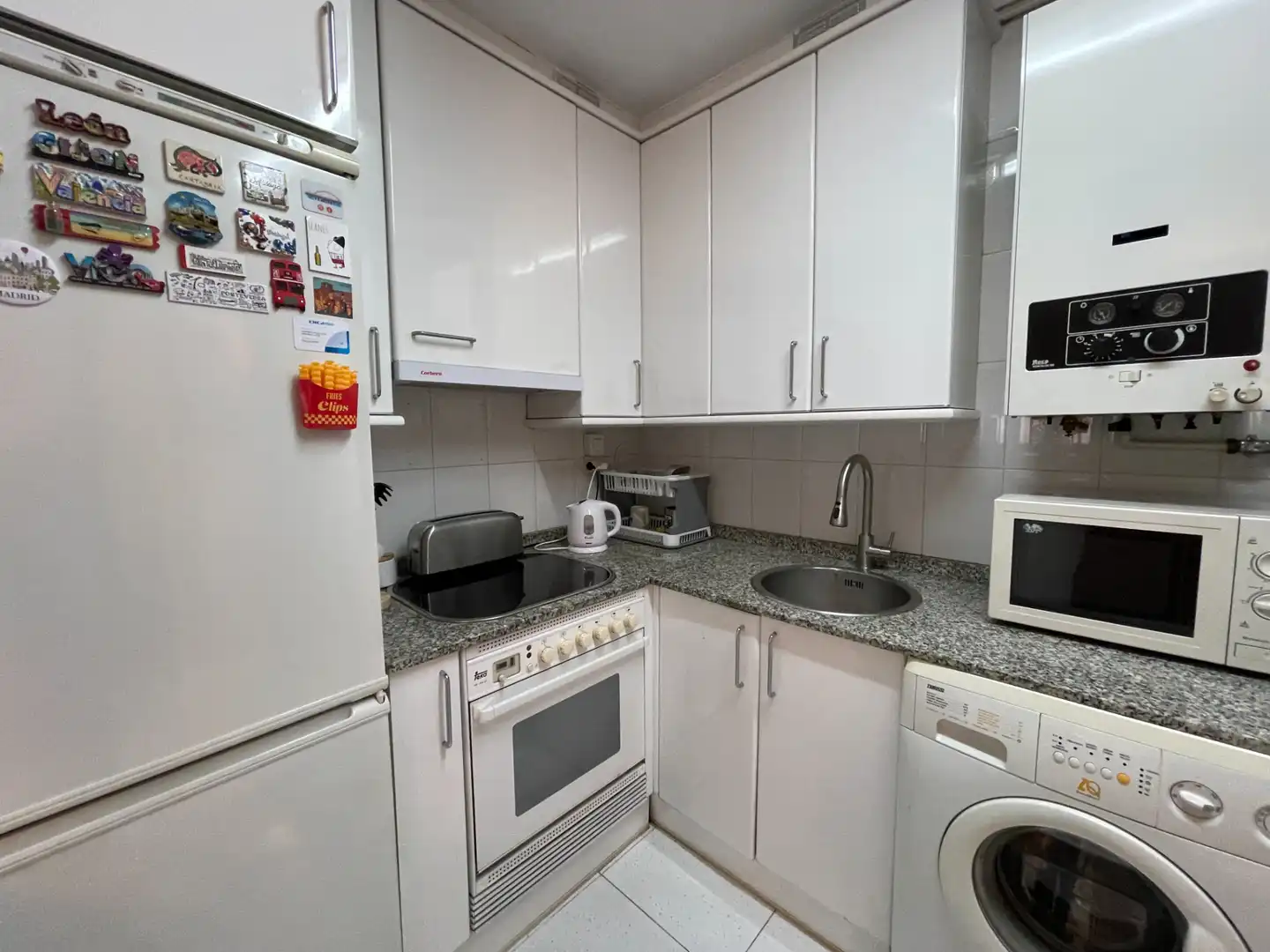 Kitchen of Apartments for sale in Gijón   with Heating, Parquet flooring and Storage room