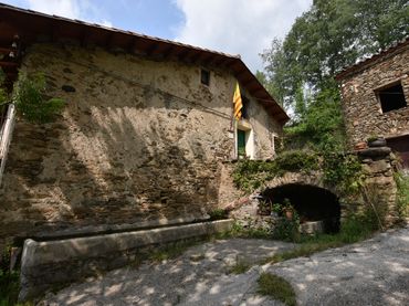 Casa rústica con jardín en venta en Vilallonga de Ter