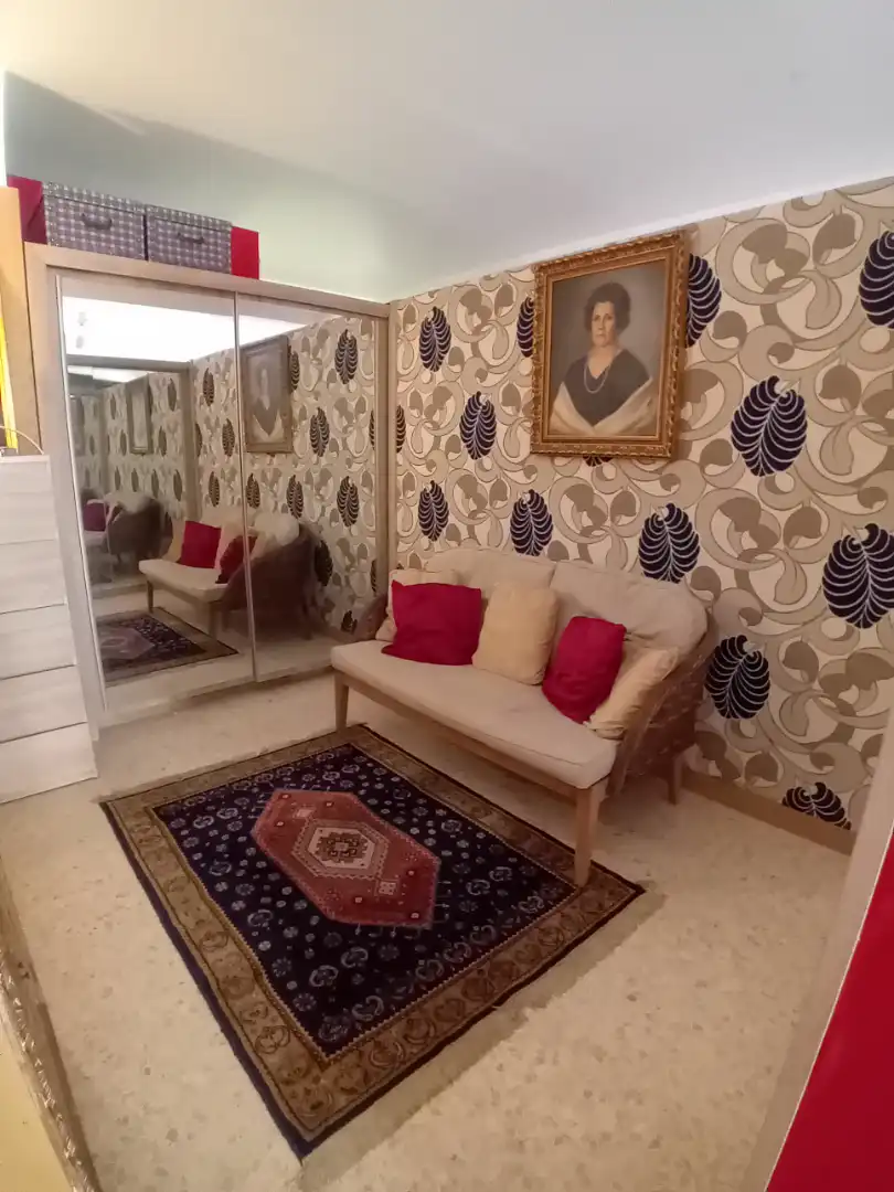 Sala d'estar de Casa adosada en venda en Málaga amb Piscina