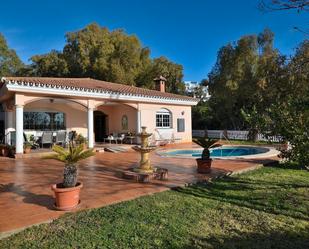 Garden of House or chalet for sale in Benalmádena  with Air Conditioner, Heating and Private garden