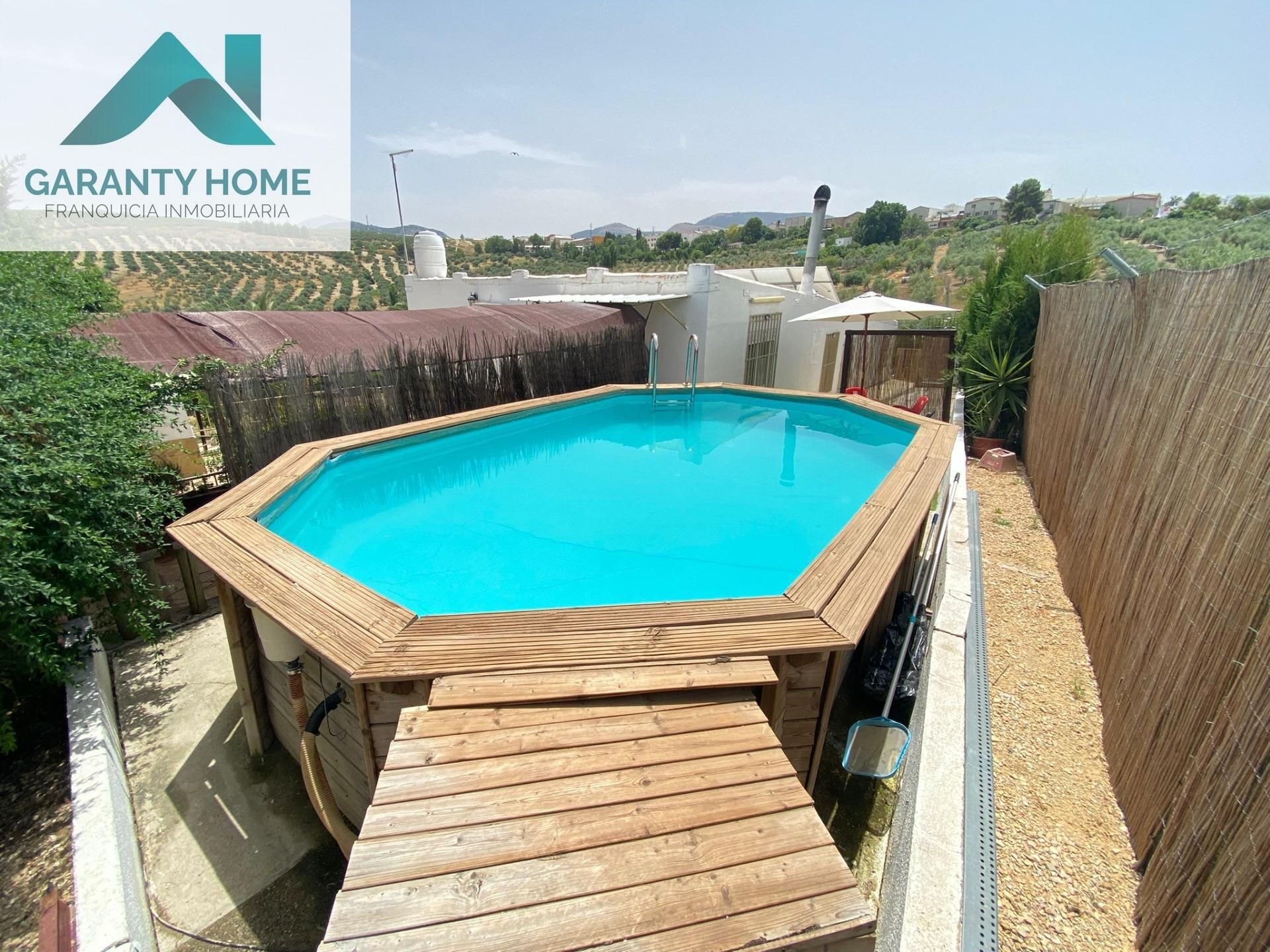 Piscina de Casa o xalet en venda en Torredonjimeno amb Aire condicionat, Jardí privat i Terrassa