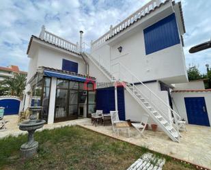 Vista exterior de Casa o xalet en venda en La Pobla de Farnals amb Aire condicionat, Terrassa i Piscina