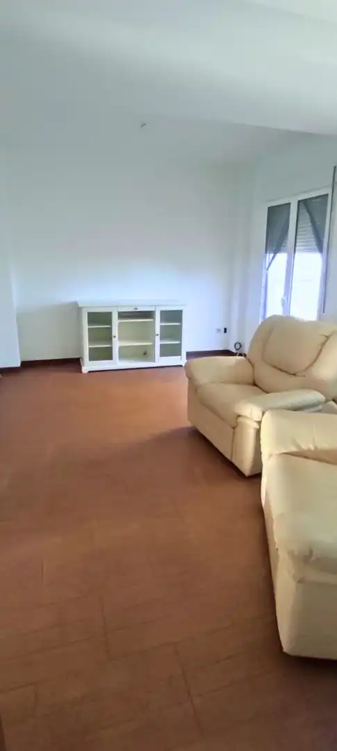 Sala d'estar de Casa adosada en venda en La Carlota amb Terrassa, Forn i Rentadora