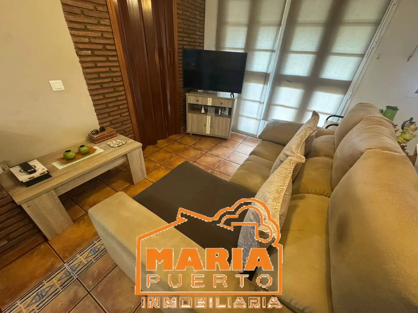 Sala d'estar de Casa adosada en venda en Málaga amb Aire condicionat i Terrassa