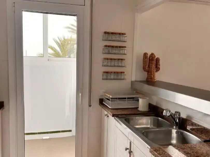 Cuina de Àtic de lloguer en El Vendrell amb Aire condicionat, Parquet i Piscina