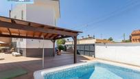 Piscina de Casa adosada en venda en  Granada Capital amb Aire condicionat, Calefacció i Jardí privat