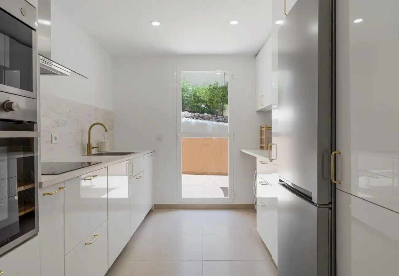 Kitchen of Apartments for rent in Marbella  with Air Conditioner, Private garden and Furnished