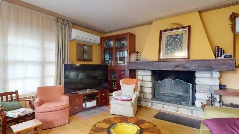 Sala d'estar de Casa o xalet en venda en La Muela amb Aire condicionat, Calefacció i Jardí privat