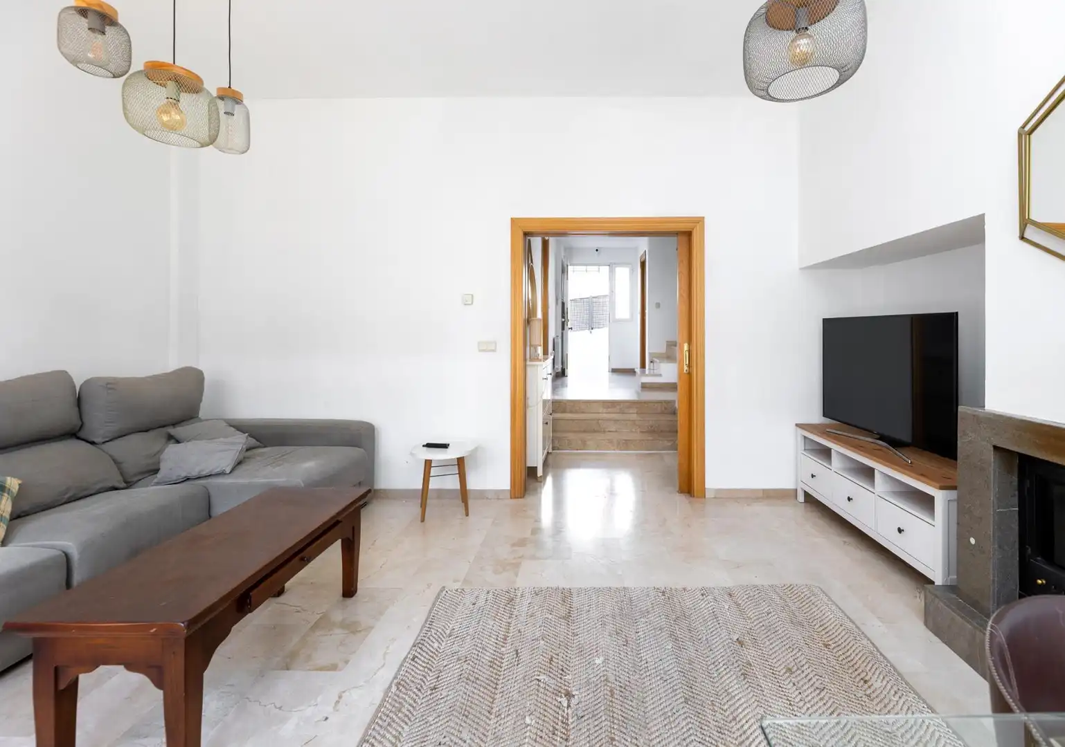 Sala d'estar de Casa adosada en venda en Granada amb Aire condicionat, Calefacció i Piscina comunitària