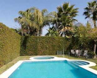 Piscina de Casa o xalet de lloguer en Bollullos de la Mitación amb Aire condicionat, Calefacció i Jardí privat