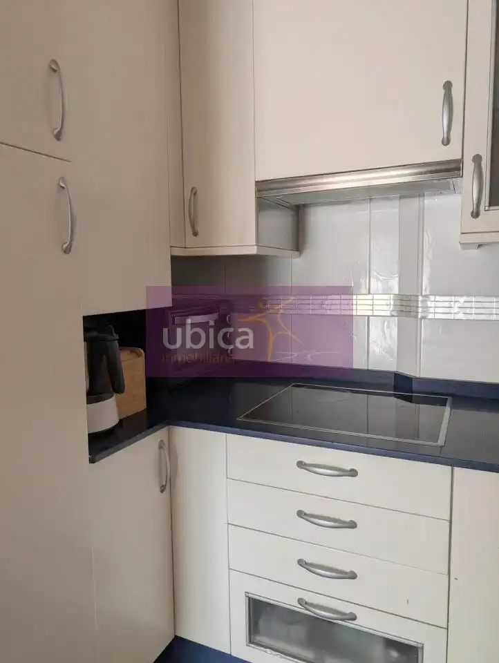 Kitchen of Attic for sale in Vigo   with Heating, Parquet flooring and Terrace