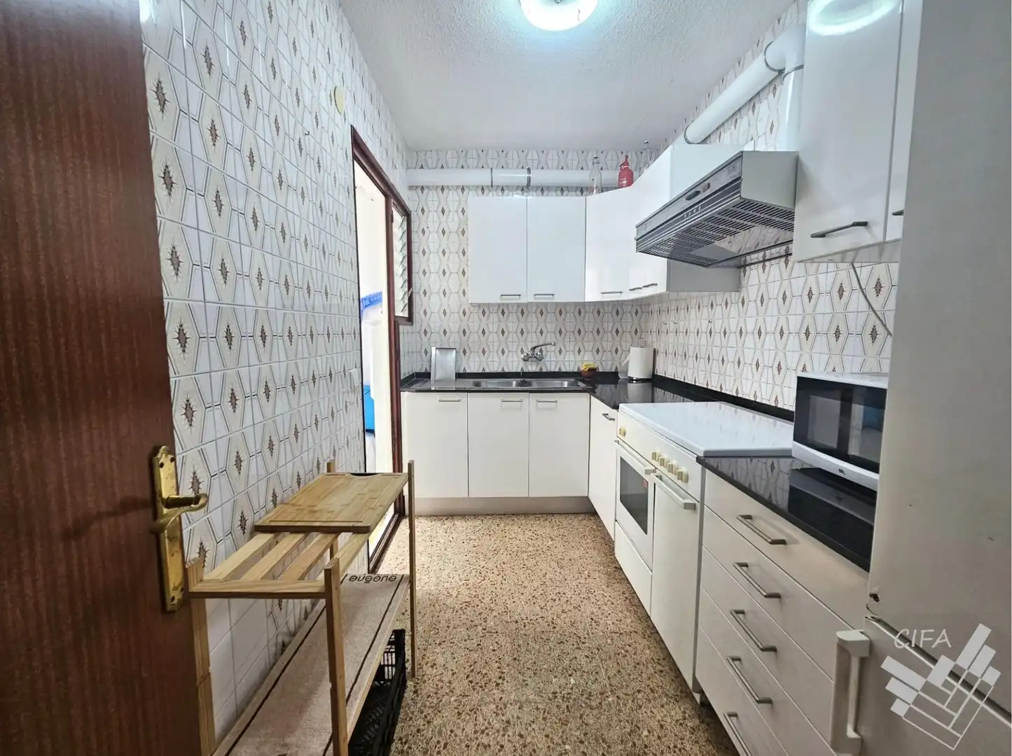 Kitchen of Flat for sale in Alcanar  with Air Conditioner, Terrace and Furnished