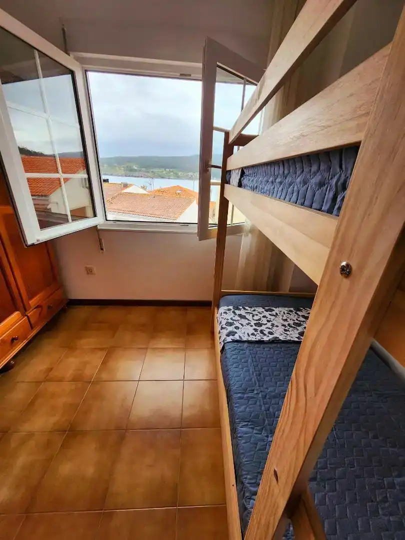 Schlafzimmer von Wohnung zur Miete in Laxe