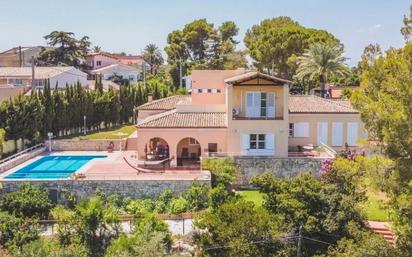 Vista exterior de Casa o xalet en venda en Alzira amb Calefacció, Jardí privat i Parquet