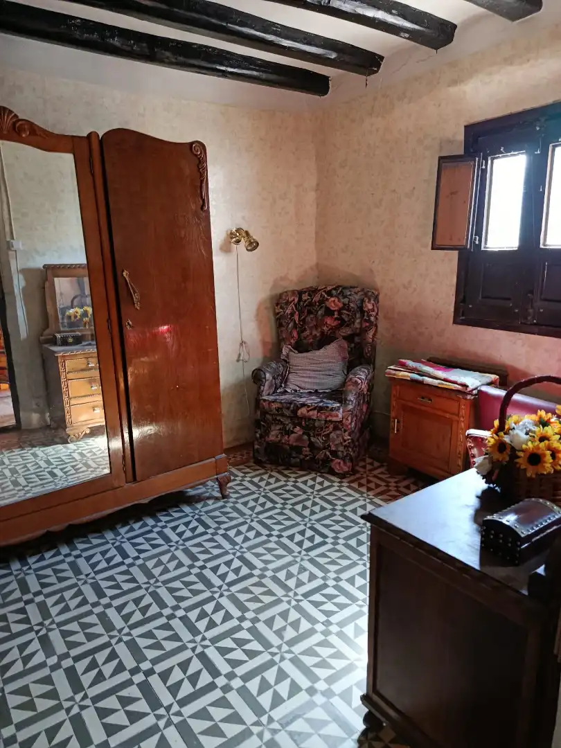 Sala de estar de Casa adosada en venta en Munilla con Trastero, Amueblado y Balcón