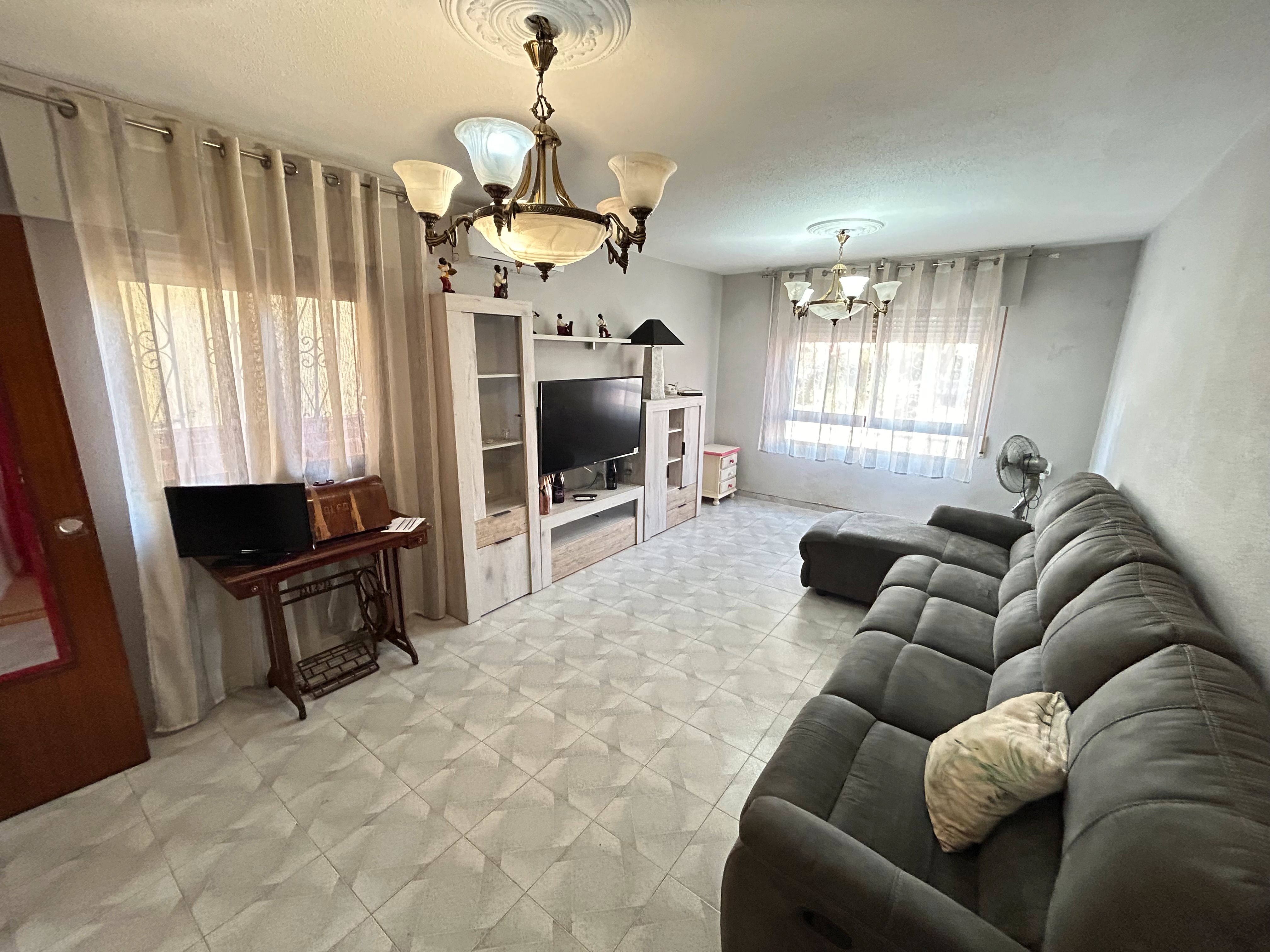 Living room of Single-family semi-detached for sale in  Almería Capital  with Air Conditioner, Heating and Terrace