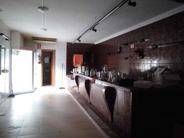 Local comercial en venda a 23