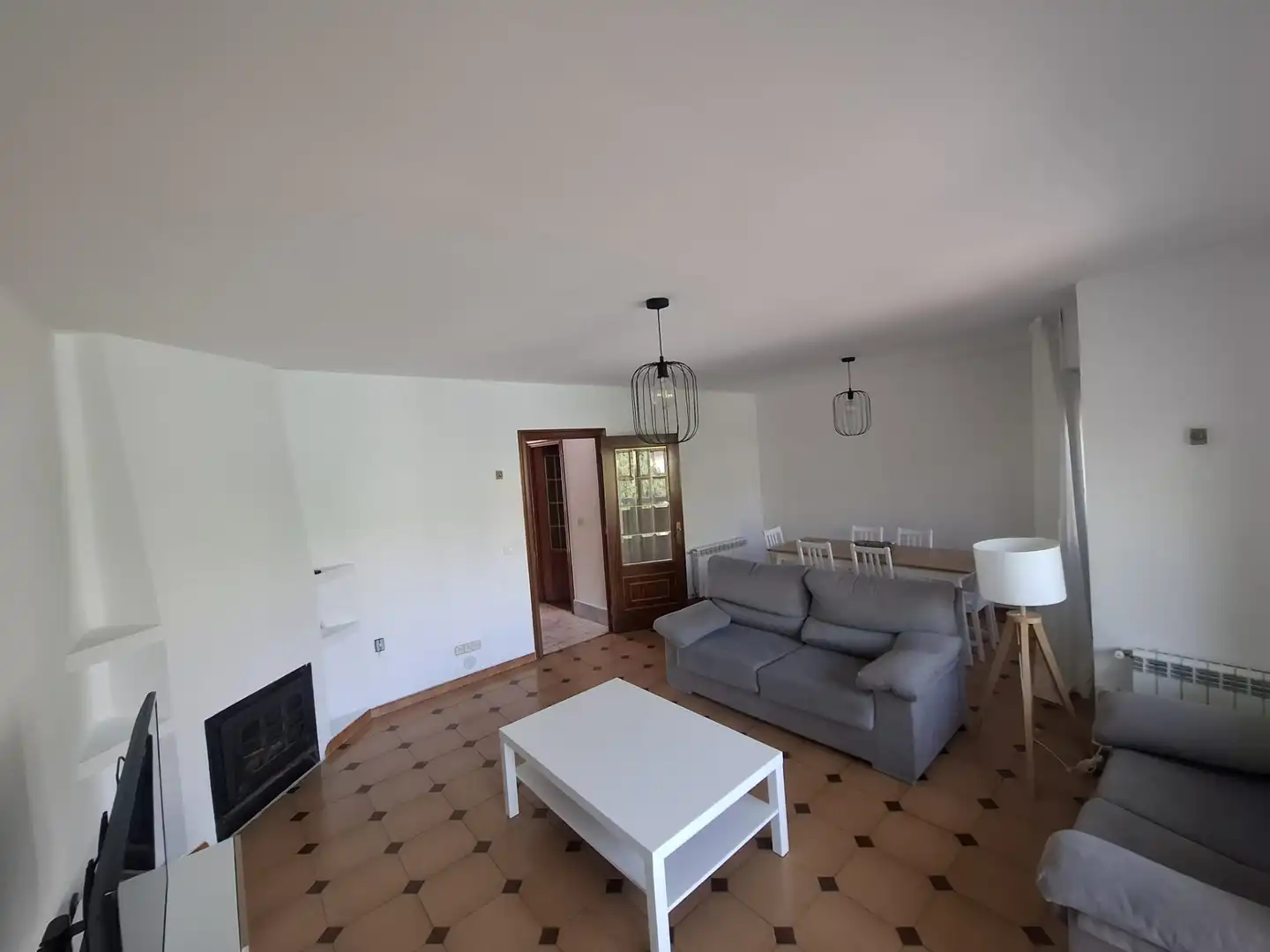 Sala d'estar de Casa adosada en venda en Villaviciosa de Odón amb Aire condicionat, Calefacció i Jardí privat