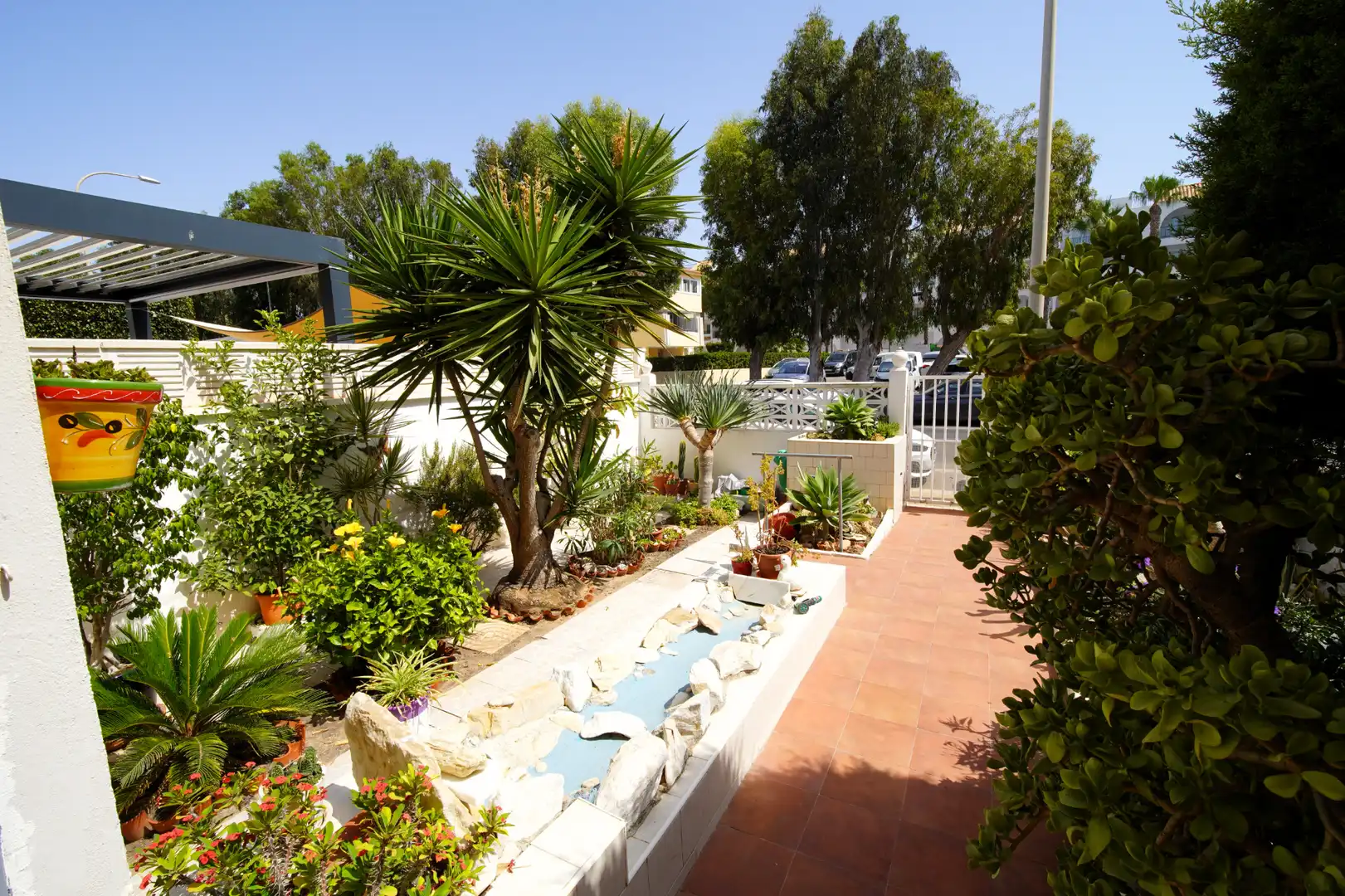 Jardí de Casa adosada en venda en Roquetas de Mar amb Jardí privat, Terrassa i Traster