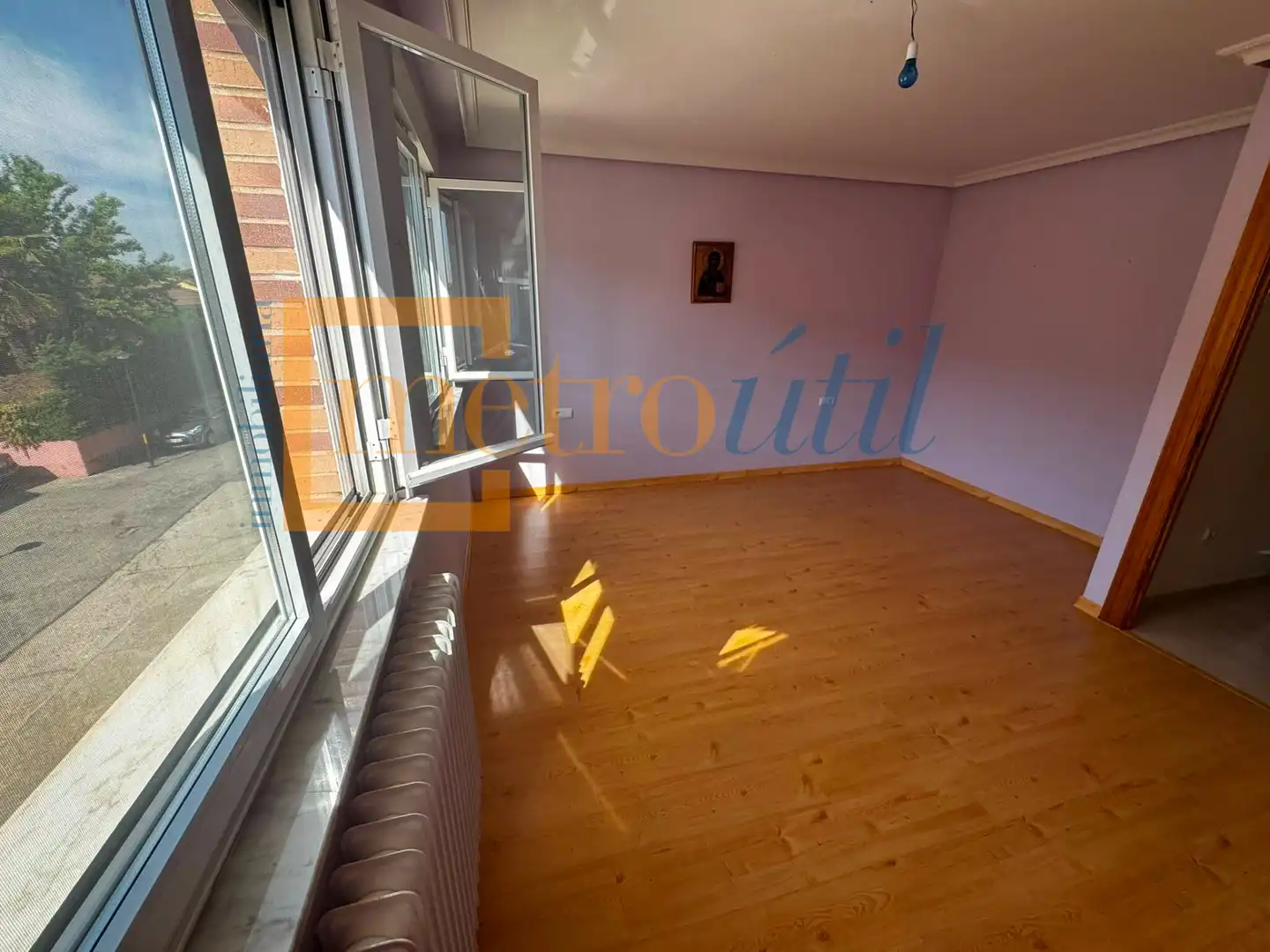 Sala d'estar de Casa adosada en venda en Galindo y Perahuy amb Calefacció, Jardí privat i Parquet
