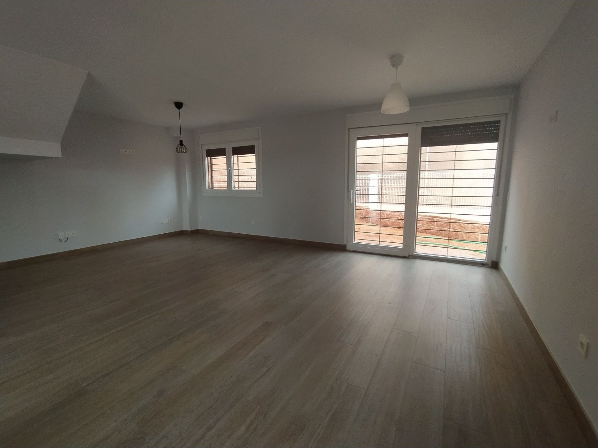Sala d'estar de Casa adosada de lloguer en Valdeolmos-Alalpardo amb Terrassa