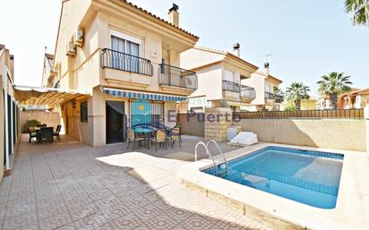 Vista exterior de Casa o xalet en venda en Mazarrón amb Aire condicionat, Calefacció i Jardí privat